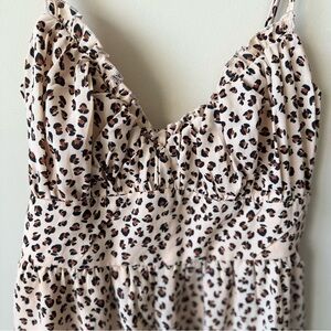 Francesca's Collections Emmupperl Animal Print Romper